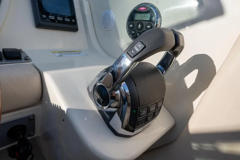Minsky's Folly II Yacht Photos Pics 2014 Chris-Craft Launch 32 throttle control and dashboard detail.