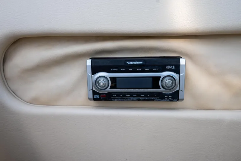 Minsky's Folly II Yacht Photos Pics Rockford Fosgate stereo system in 2014 Chris-Craft Launch 32 boat interior.