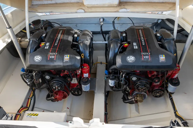 Minsky's Folly II Yacht Photos Pics Twin V8 engines in a 2014 Chris-Craft Launch 32 boat.