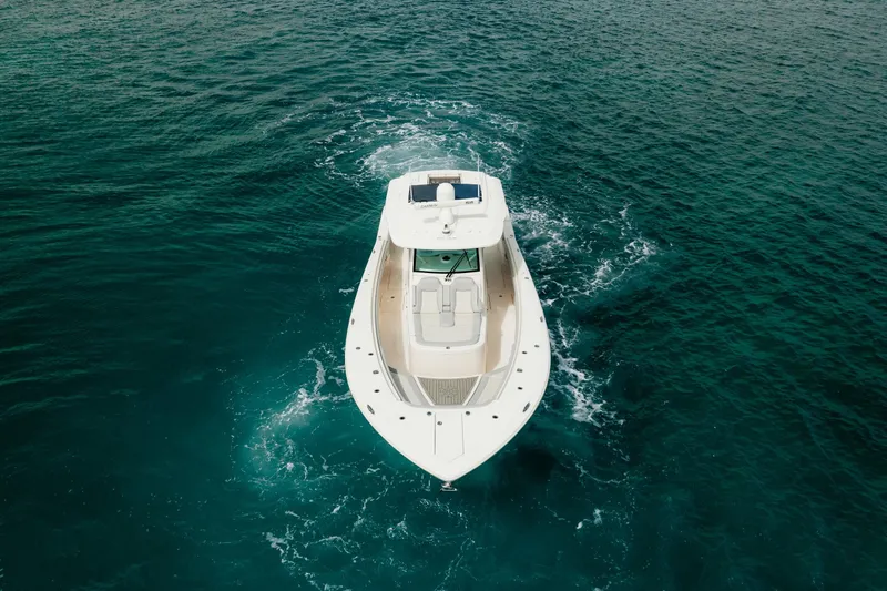 Mmxxi Yacht Photos Pics 2021 Scout 380 LXF boat cruising on open water.