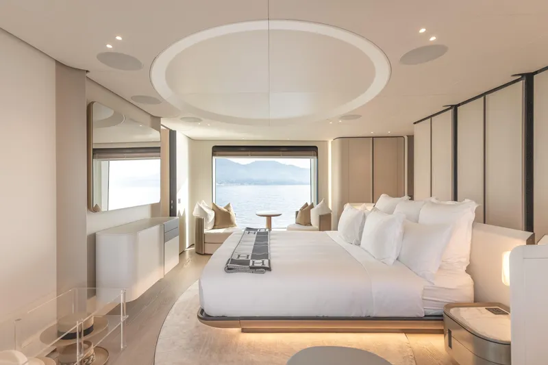 H Yacht Photos Pics Luxurious bedroom interior of 2023 Azimut Grande 35m yacht with ocean view.