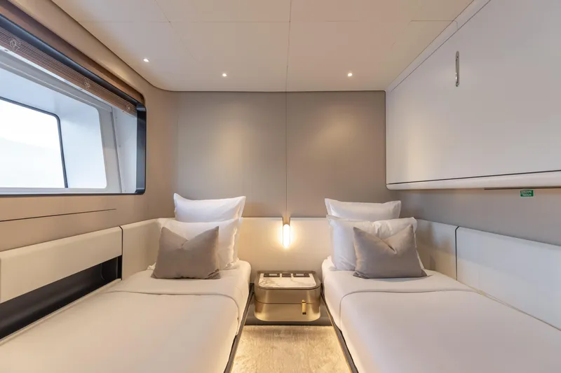 H Yacht Photos Pics Luxurious twin cabin interior of 2023 Azimut Grande 35m yacht, featuring modern design and cozy ambiance.