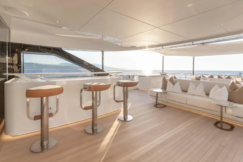 H Yacht Photos Pics Luxurious Azimut Grande 35m yacht interior with bar stools and ocean view, 2023 model.