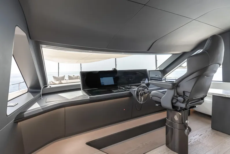 H Yacht Photos Pics Luxurious helm of 2023 Azimut Grande 35m yacht with modern controls and panoramic view.