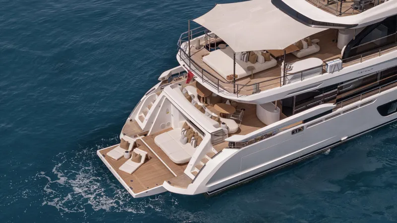H Yacht Photos Pics Luxurious 2023 Azimut Grande 35m yacht cruising on clear blue waters.