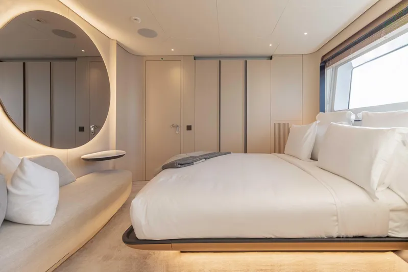 H Yacht Photos Pics Luxurious bedroom interior on 2023 Azimut Grande 35m yacht, featuring modern design and elegant furnishings.