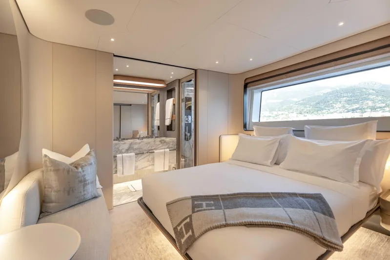 H Yacht Photos Pics Luxurious bedroom interior of 2023 Azimut Grande 35m yacht with scenic window view.