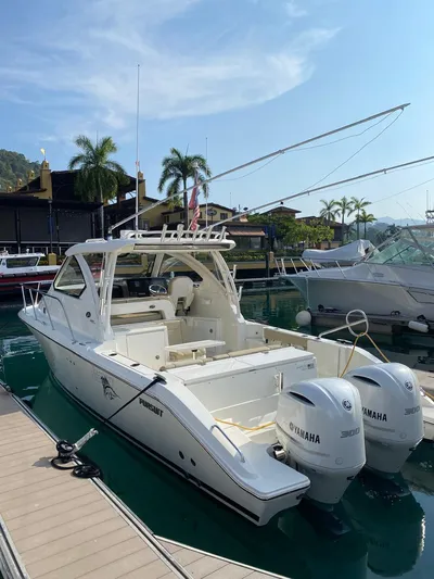 Recovery Room Yacht Photos Pics 2020 Pursuit OS 325 Offshore boat docked with twin Yamaha engines.