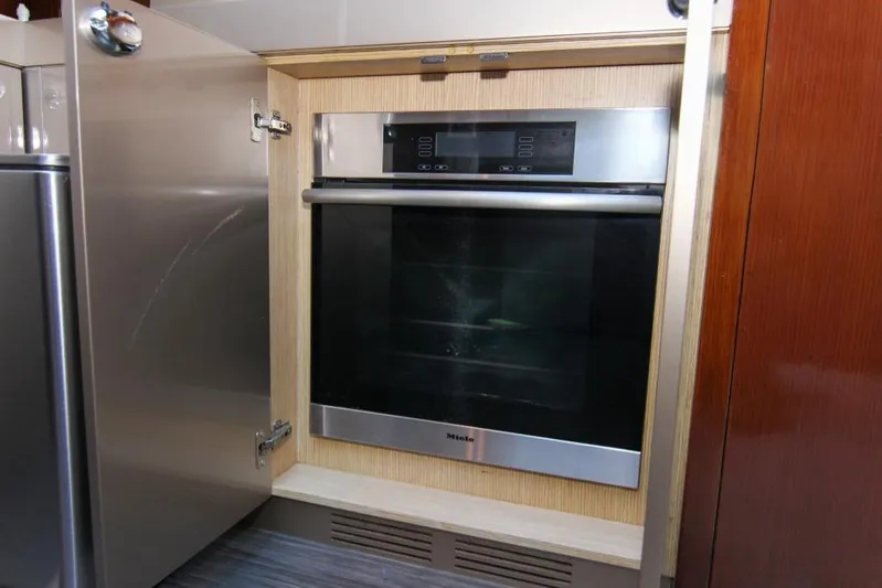 Love Life Yacht Photos Pics Built-in oven in the kitchen of a 2009 Riva 68' EGO SUPER yacht.
