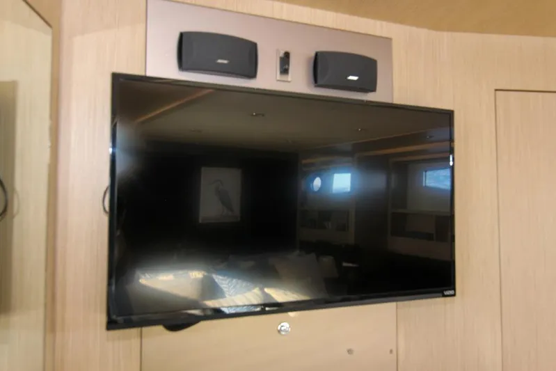 Love Life Yacht Photos Pics Flat-screen TV and speakers in 2009 Riva 68' EGO SUPER yacht interior.
