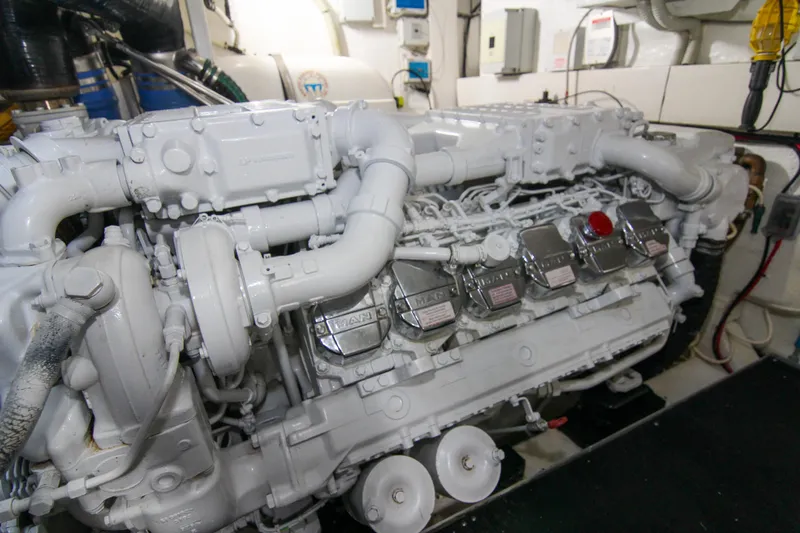 Love Life Yacht Photos Pics Engine room of 2009 Riva 68' EGO SUPER yacht, showcasing detailed machinery components.