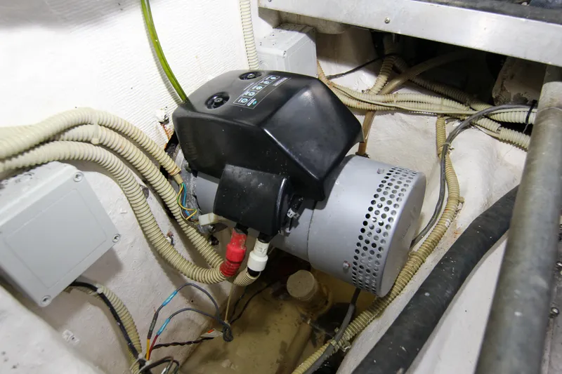 Love Life Yacht Photos Pics Engine room of 2009 Riva 68' EGO SUPER yacht, featuring mechanical components and wiring.