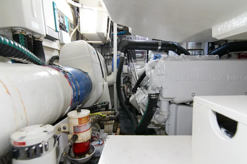 Love Life Yacht Photos Pics Engine room of 2009 Riva 68' EGO SUPER yacht, showcasing mechanical components and systems.