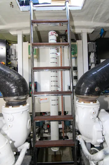 Love Life Yacht Photos Pics Engine room of 2009 Riva 68' EGO SUPER yacht with ladder and machinery.