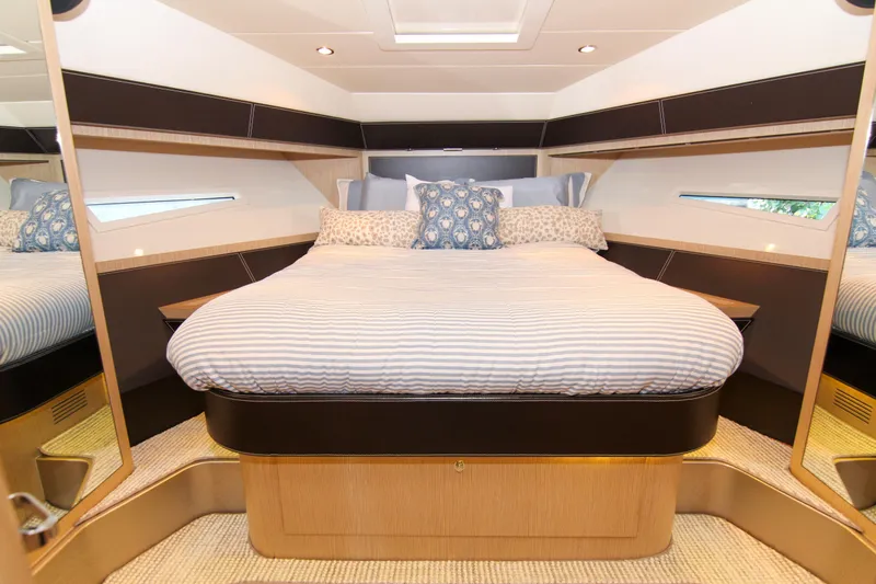 Love Life Yacht Photos Pics Luxurious bedroom interior of 2009 Riva 68' EGO SUPER yacht with elegant bedding.