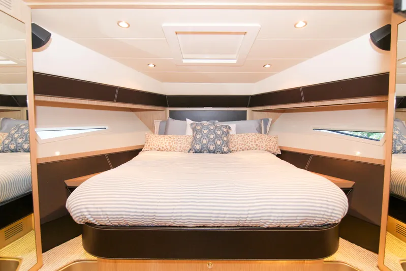 Love Life Yacht Photos Pics Luxurious bedroom interior of 2009 Riva 68' EGO SUPER yacht with elegant bedding.