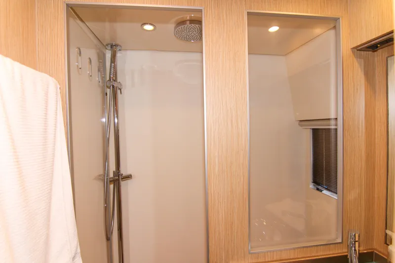 Love Life Yacht Photos Pics Luxurious bathroom shower in 2009 Riva 68' EGO SUPER yacht, featuring modern fixtures.