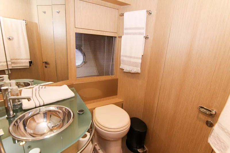 Love Life Yacht Photos Pics Luxurious bathroom in 2009 Riva 68' EGO SUPER yacht with modern fixtures and elegant design.