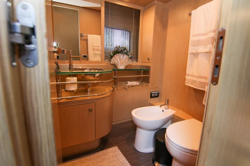 Love Life Yacht Photos Pics Luxurious bathroom in 2009 Riva 68' EGO SUPER yacht with modern fixtures.