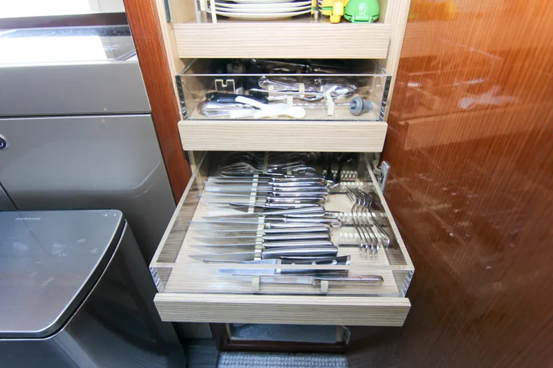 Love Life Yacht Photos Pics Cutlery drawer in a 2009 Riva 68' EGO SUPER yacht kitchen.