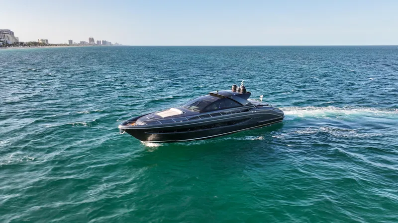 Love Life Yacht Photos Pics Luxurious 2009 Riva 68' EGO SUPER yacht cruising on open sea.