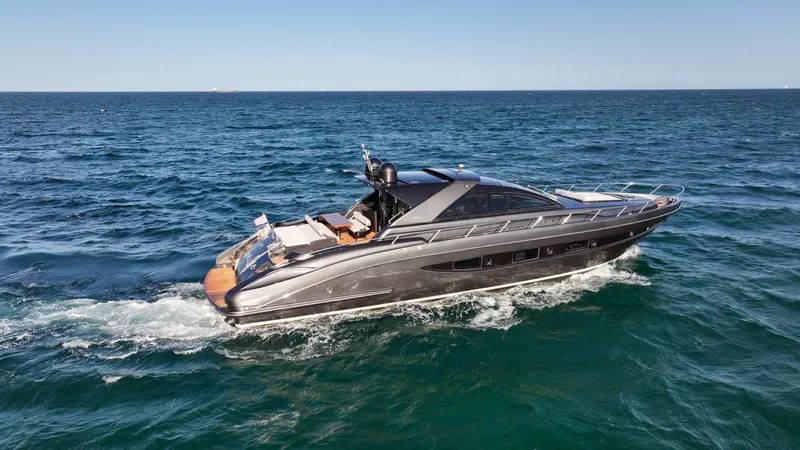 Love Life Yacht Photos Pics Luxury 2009 Riva 68' EGO SUPER yacht cruising on open sea.