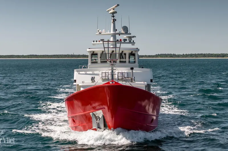  Yacht Photos Pics Red Altena Trawler boat cruising on open water, 2009 model.