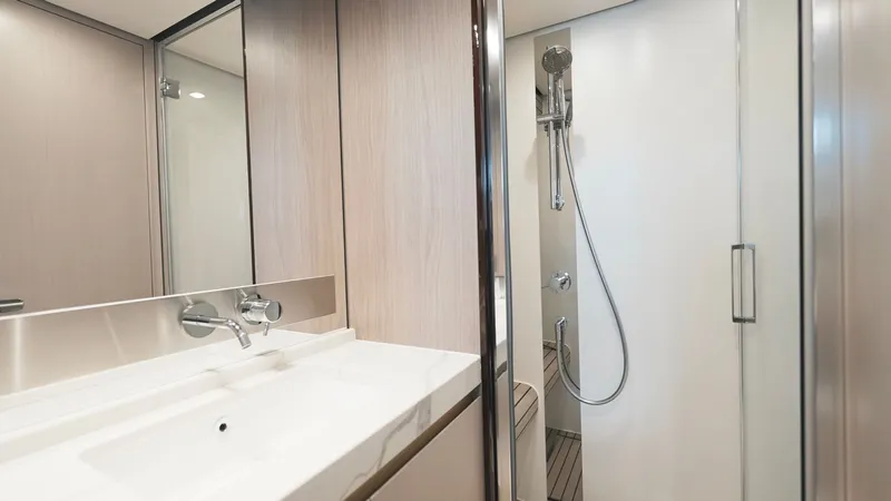 Skoupidia Yacht Photos Pics Modern bathroom in Azimut 60 Fly 2022 yacht.