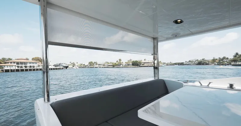 Skoupidia Yacht Photos Pics Azimut 60 Fly 2022 yacht with water and coastline view.