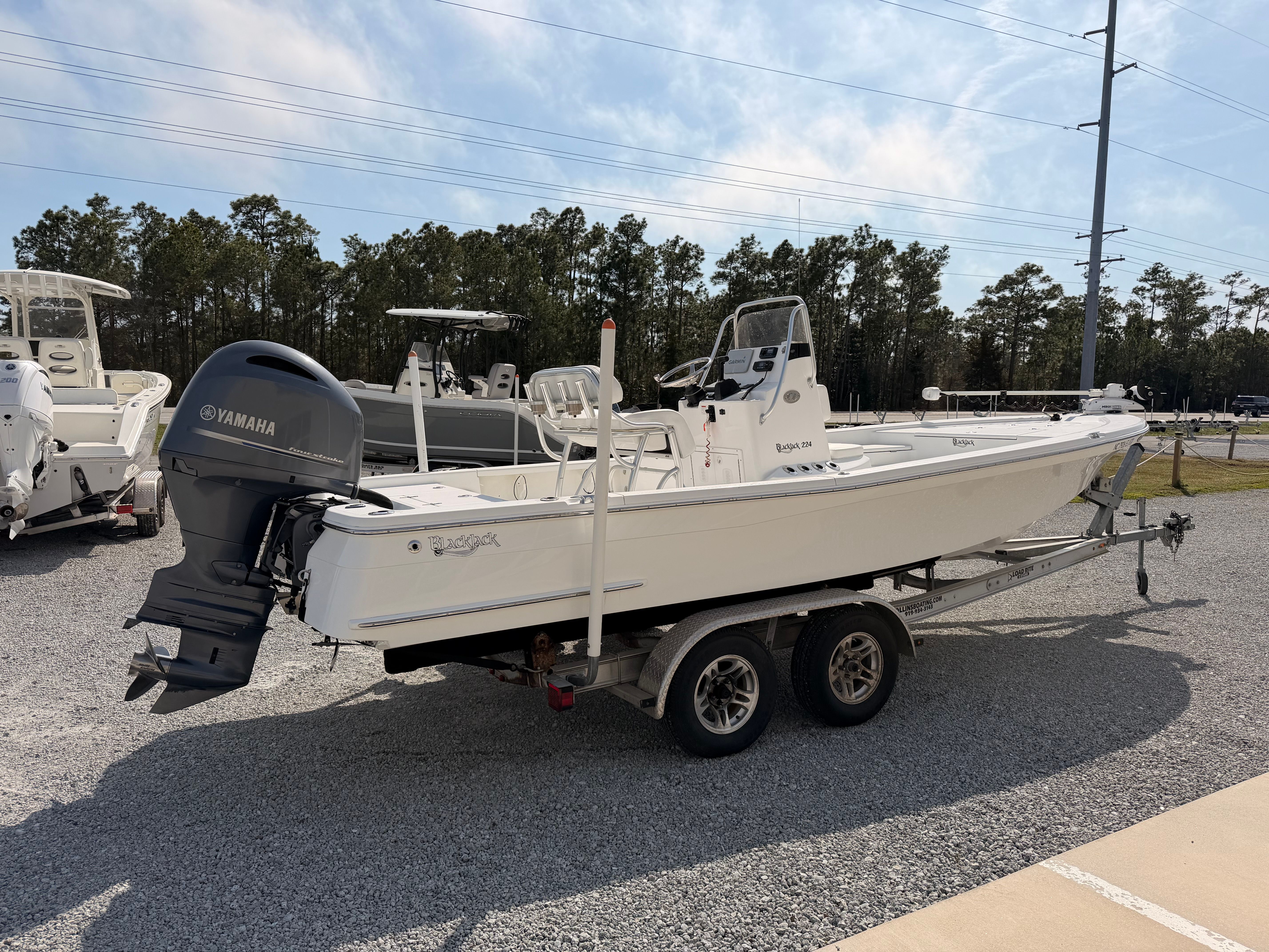 2019 BlackJack 224 boat with Yamaha engine on trailer.