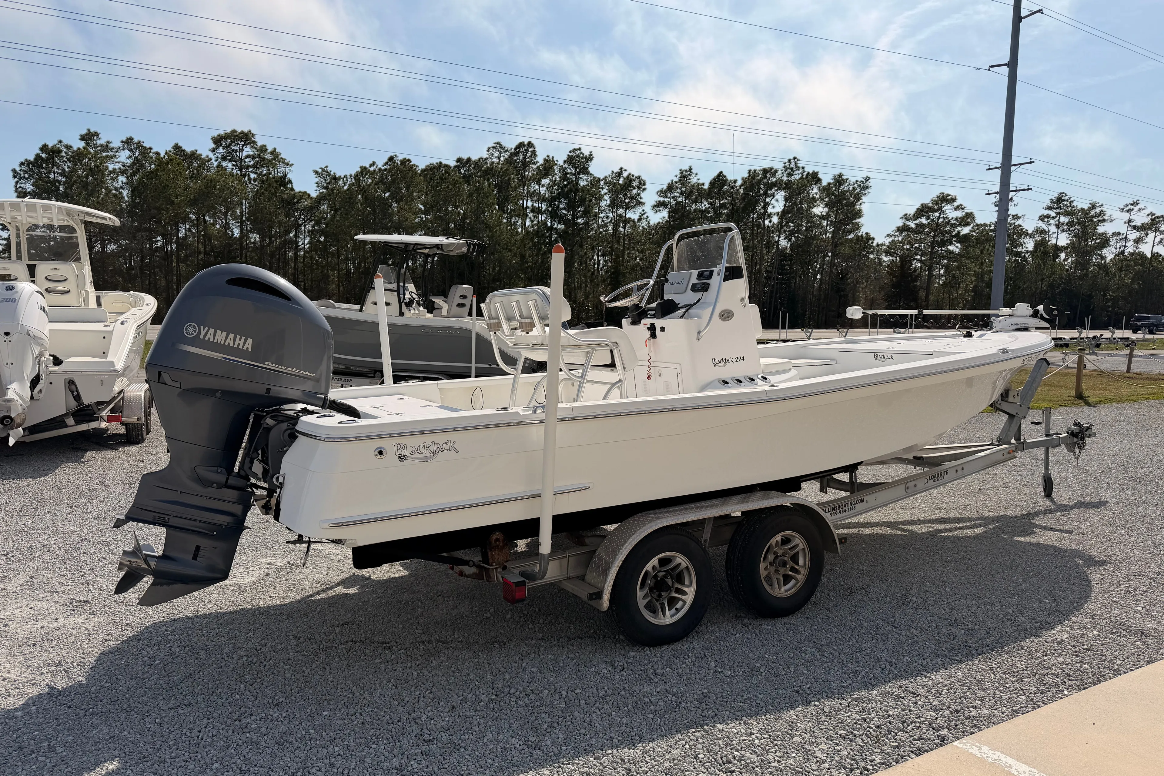 2019 BlackJack 224 boat with Yamaha engine on trailer.