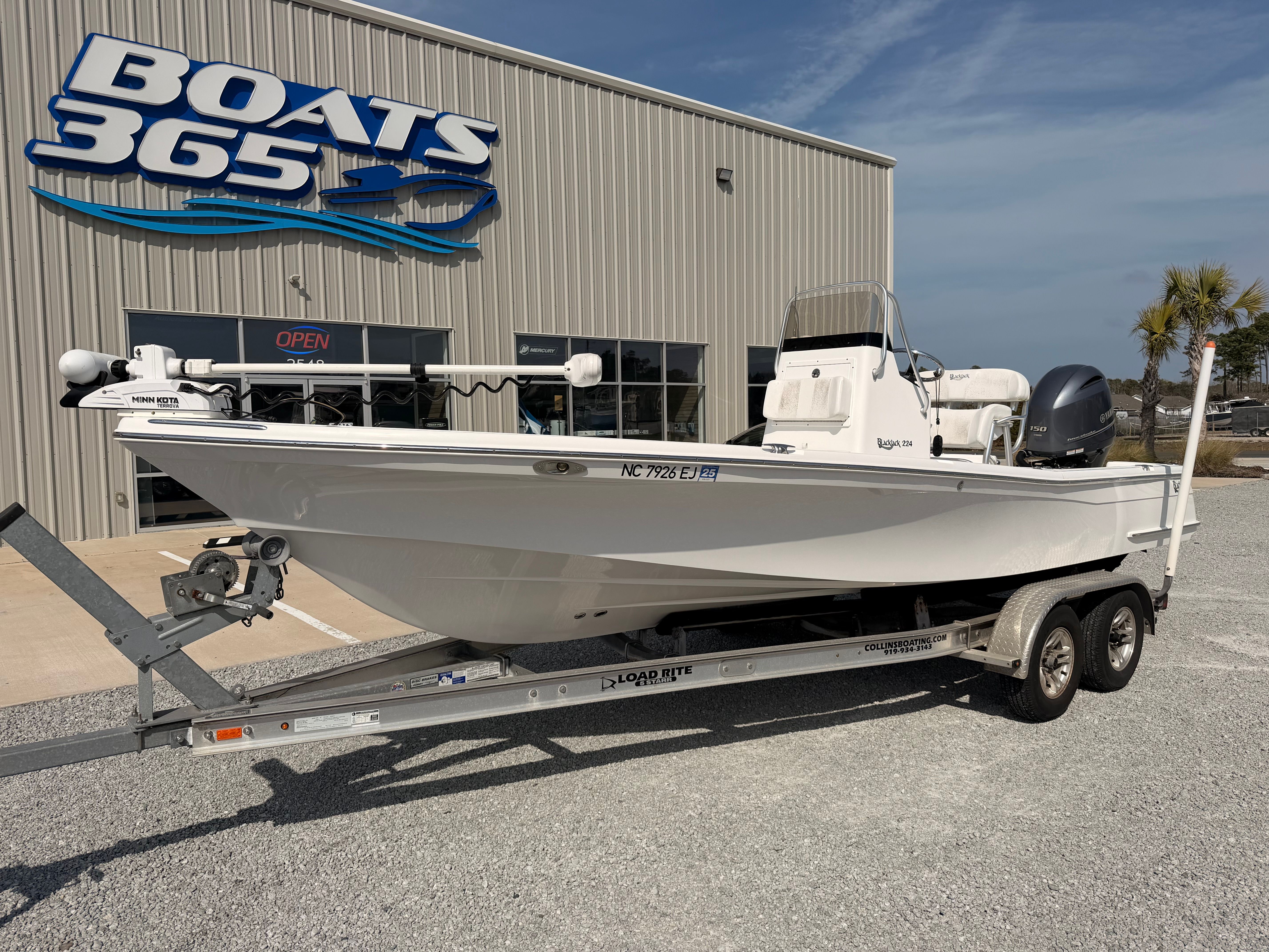 2019 BlackJack 224 boat on trailer outside Boats 365 store.