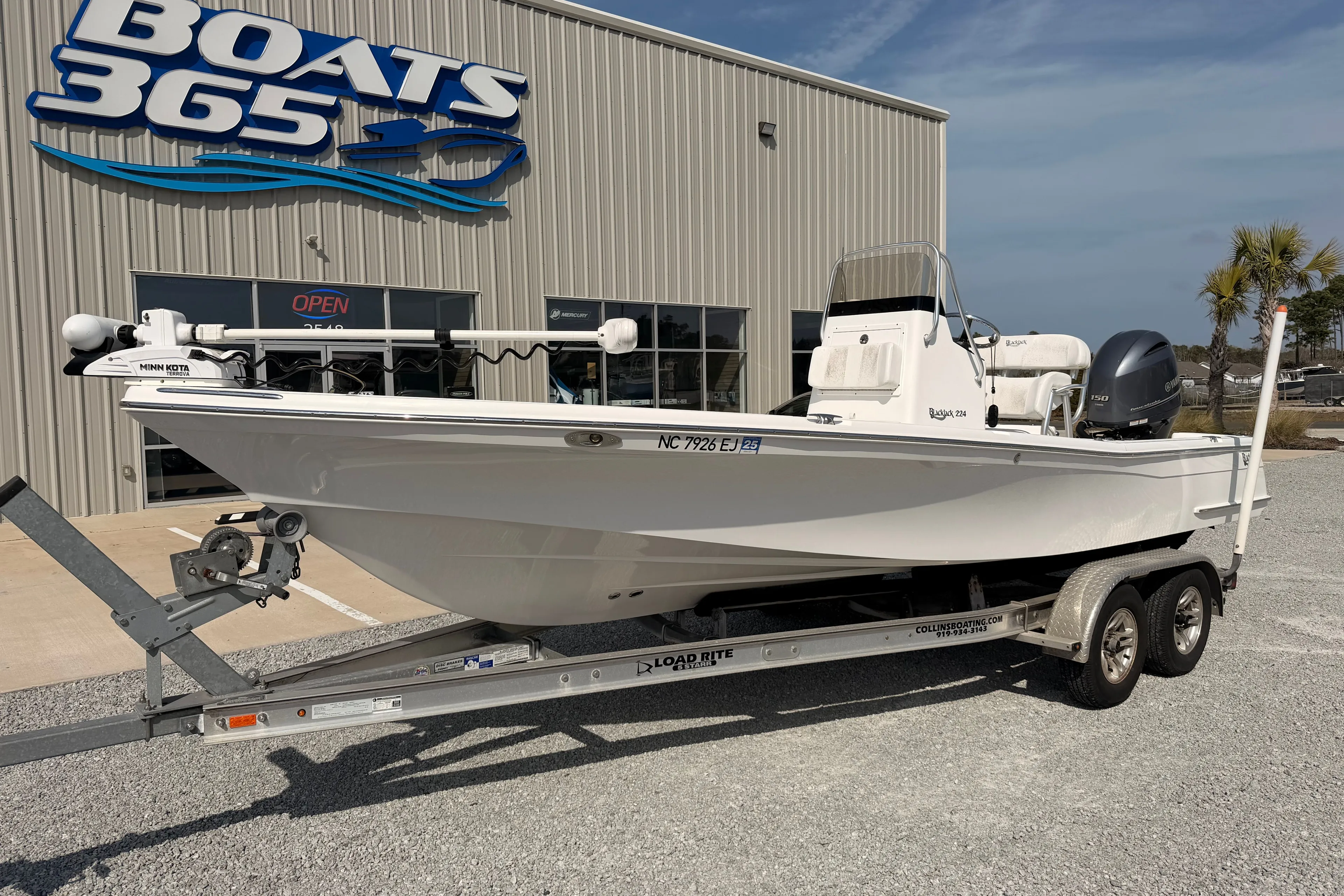 2019 BlackJack 224 boat on trailer outside Boats 365 store.