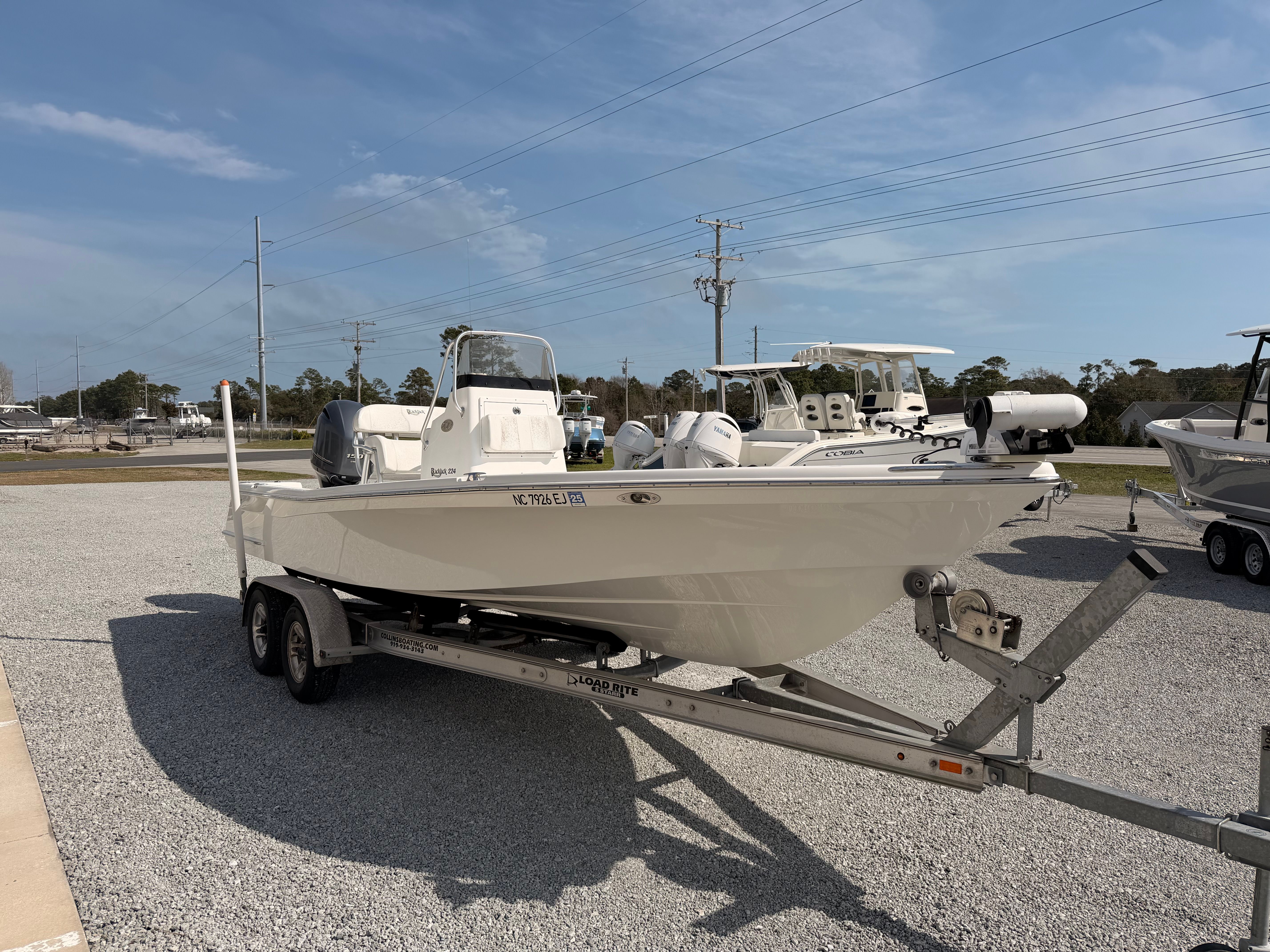 2019 BlackJack 224 boat on trailer outdoors.