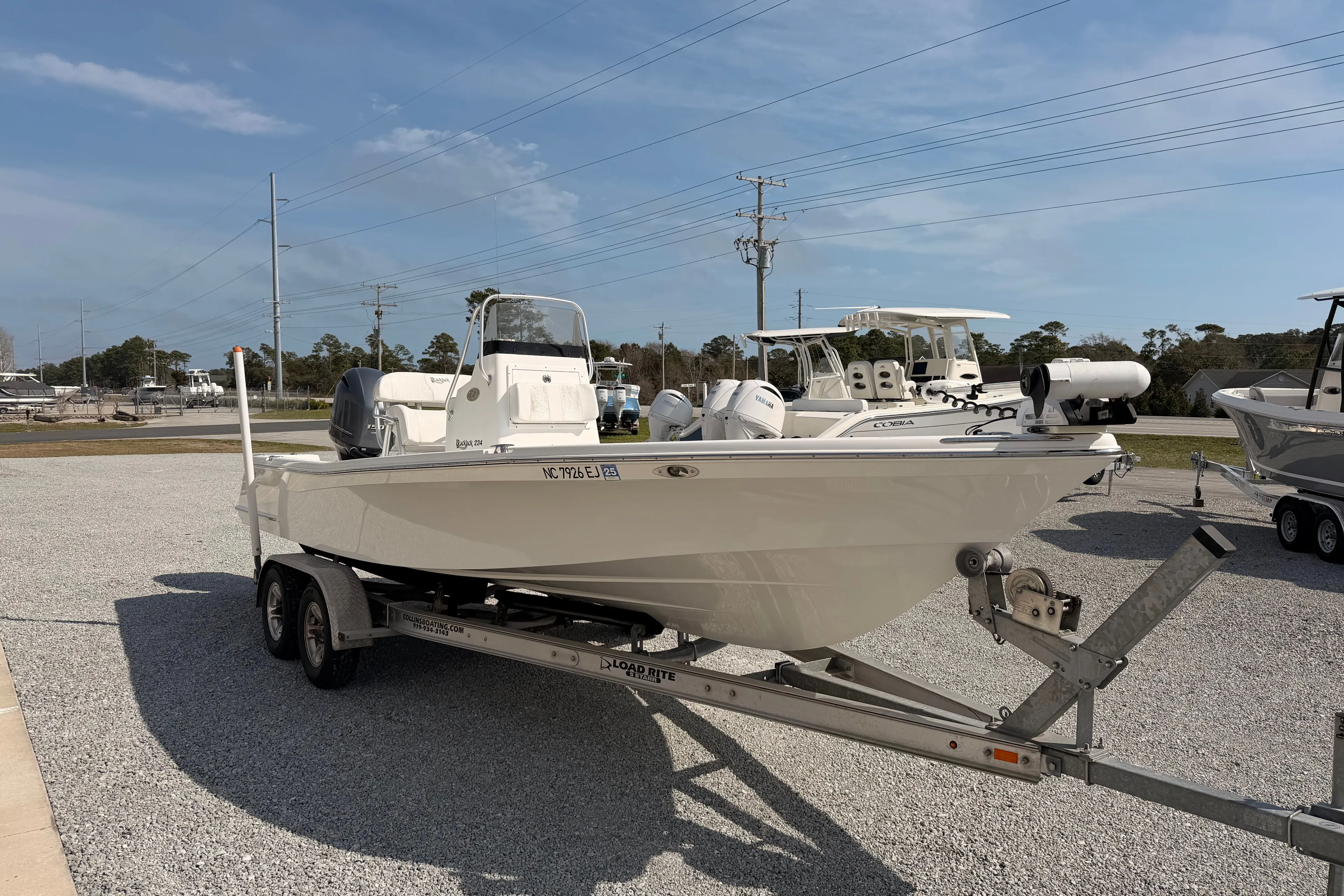 2019 BlackJack 224 boat on trailer outdoors.