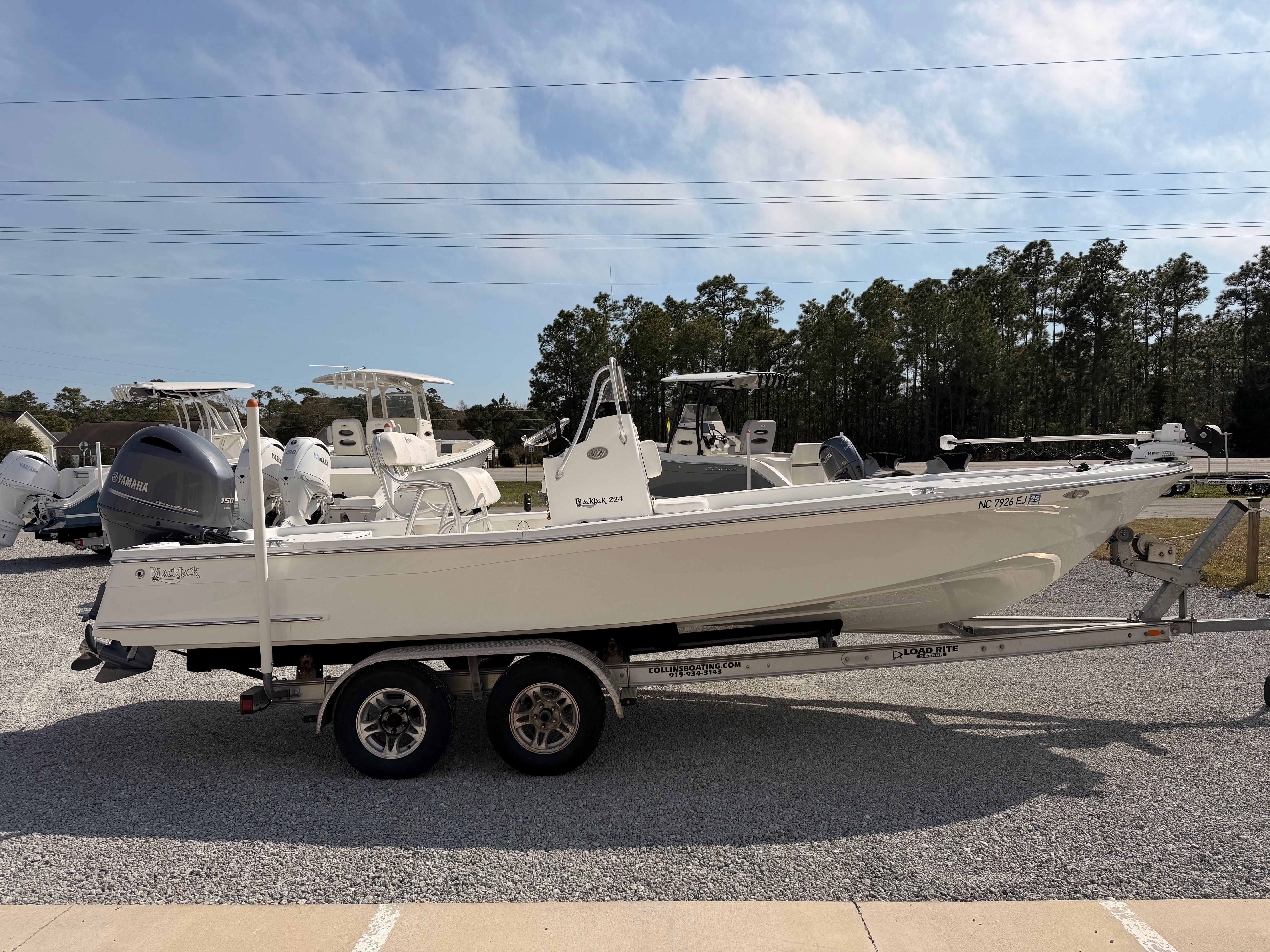 2019 BlackJack 224 boat on trailer outdoors.