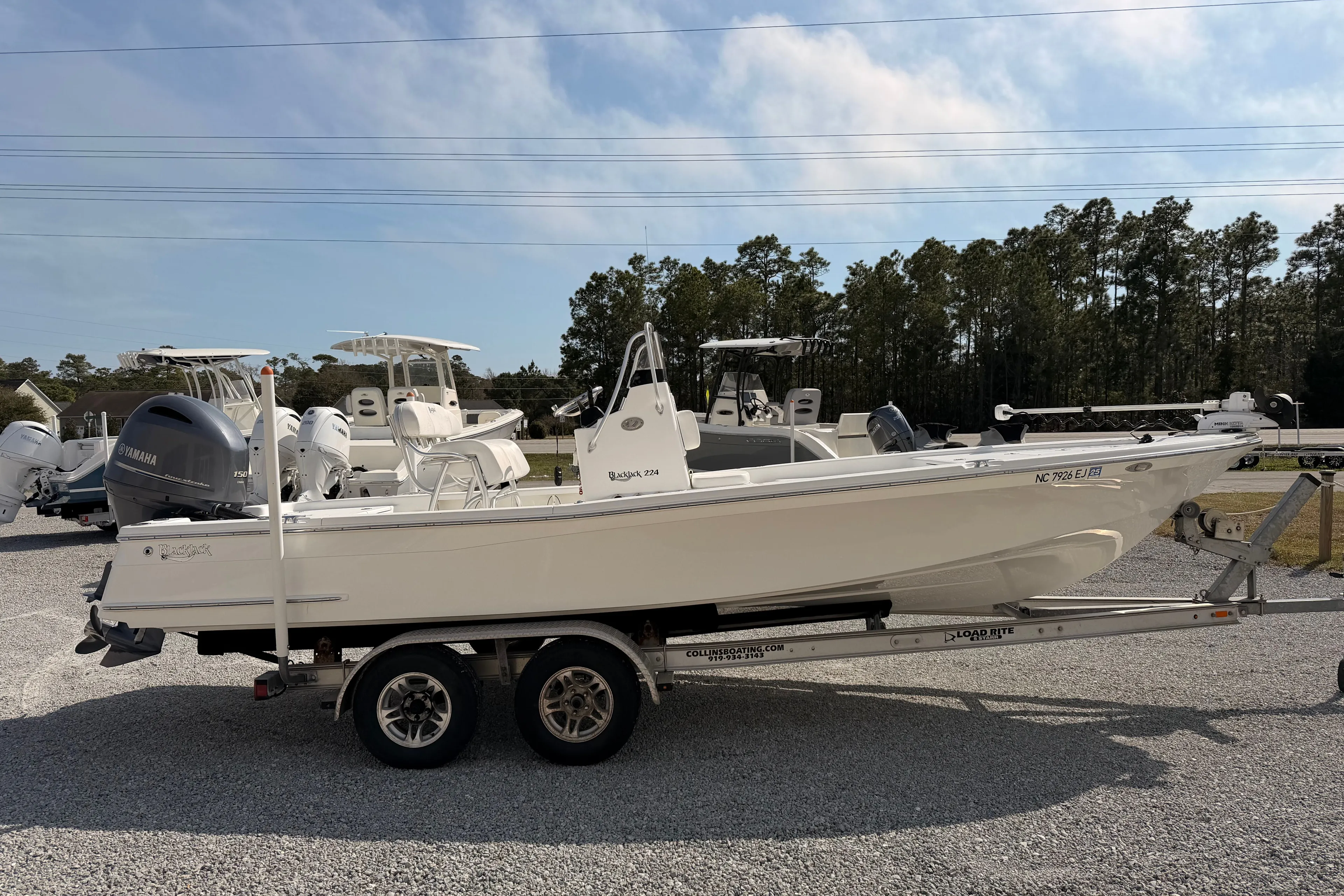 2019 BlackJack 224 boat on trailer outdoors.