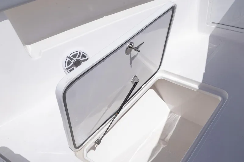  Yacht Photos Pics Open storage compartment on 2025 Streamline R 35 boat, featuring a sleek white design.