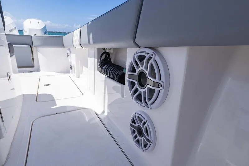  Yacht Photos Pics 2025 Streamline R 35 boat interior with speakers and seating, showcasing modern design.