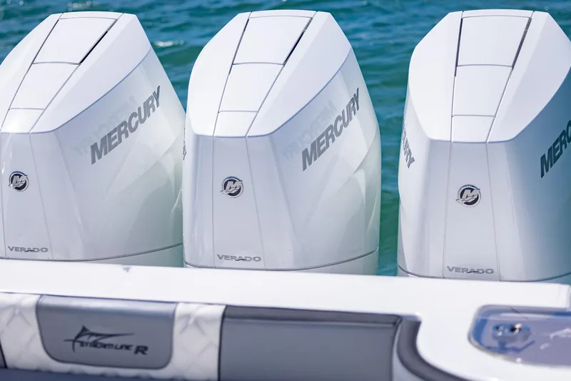  Yacht Photos Pics Triple Mercury Verado engines on a 2025 Streamline R 35 boat in the water.