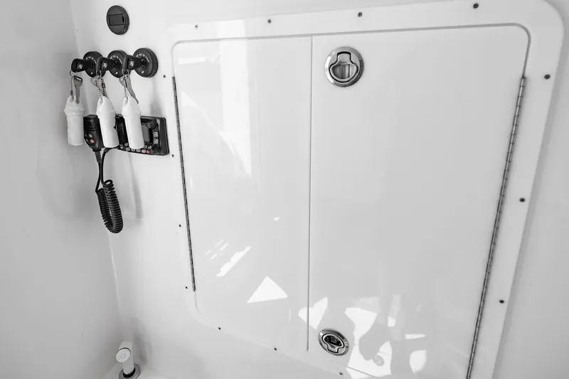  Yacht Photos Pics 2025 Streamline R 35 boat interior with storage compartment and hanging accessories.