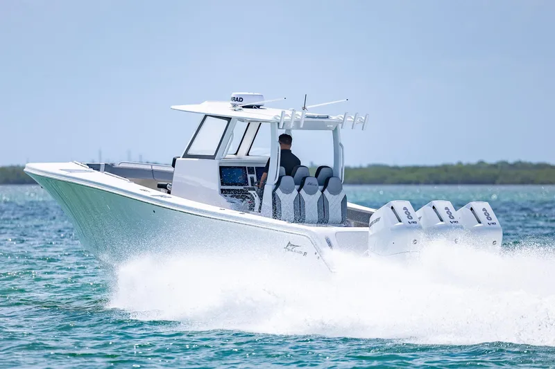  Yacht Photos Pics Streamline R 35 boat cruising on water, 2025 model, with four powerful outboard engines.