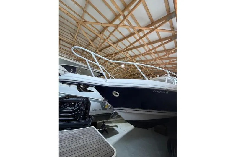  Yacht Photos Pics 2009 Intrepid 377 Walkaround boat in storage, showcasing sleek design and sturdy build.