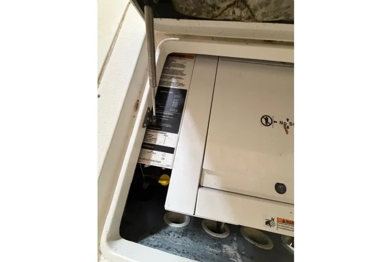  Yacht Photos Pics 2009 Intrepid 377 Walkaround engine compartment with visible control panel.