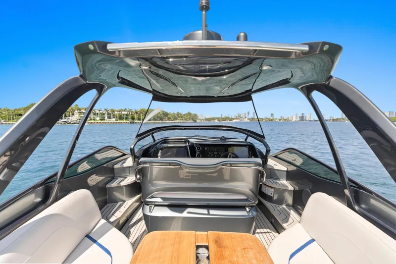 Mischief Yacht Photos Pics Luxury 2020 Princess R35 yacht interior with sleek design and waterfront view.
