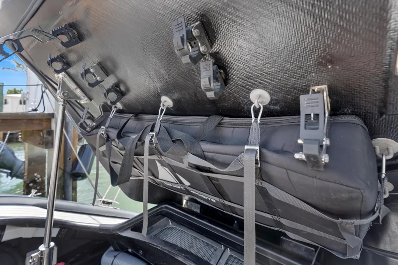 Mischief Yacht Photos Pics Storage compartment of 2020 Princess R35 boat with secured equipment.