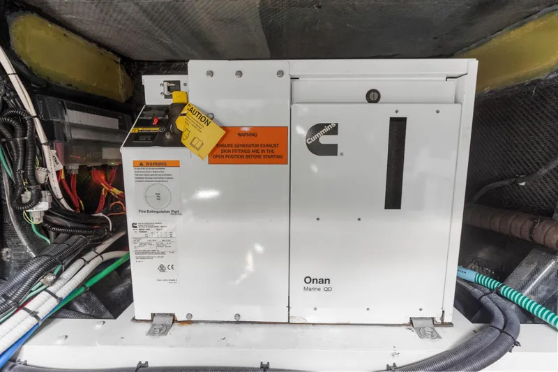 Mischief Yacht Photos Pics Cummins Onan Marine QD generator in 2020 Princess R35 yacht engine room.