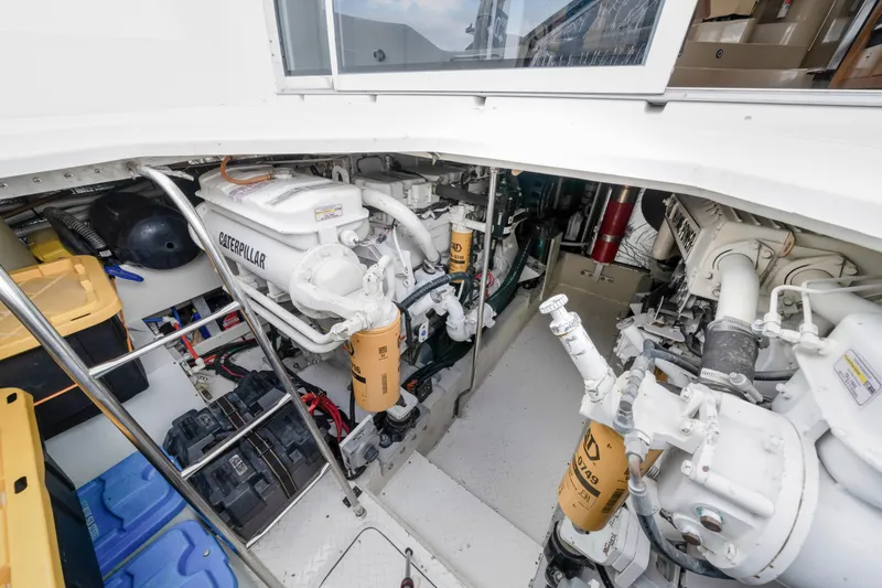  Yacht Photos Pics Engine room of 2001 Cruisers Yachts 5000 Sedan Sport with Caterpillar engines.