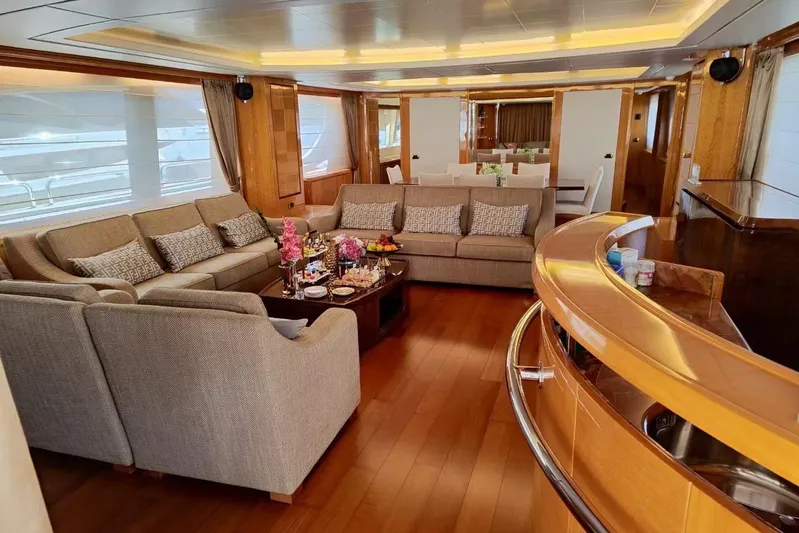  Yacht Photos Pics Luxurious interior of 2010 Azimut 105 yacht with elegant seating and wooden accents.