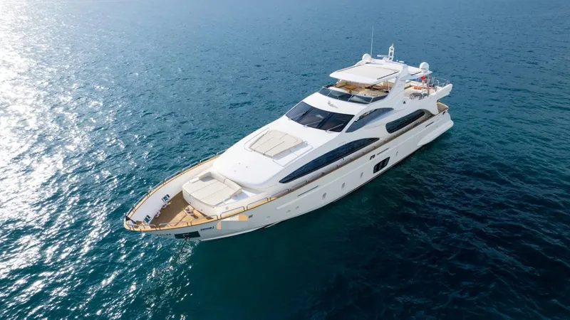  Yacht Photos Pics Luxurious 2010 Azimut 105 yacht cruising on open blue sea.